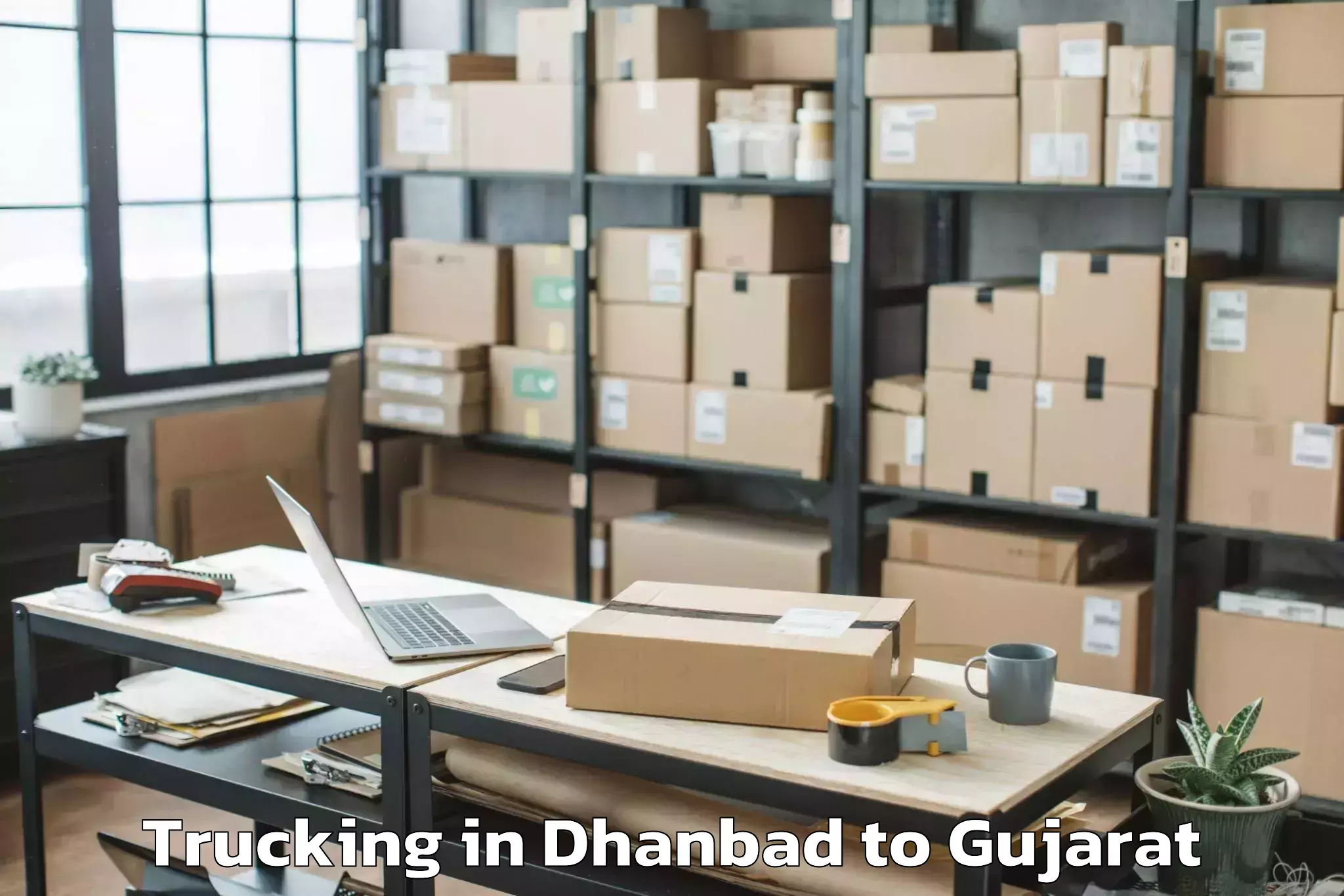 Reliable Dhanbad to Abrama Trucking